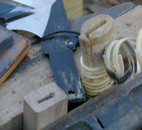Broken Saw handle with Replacement being made.